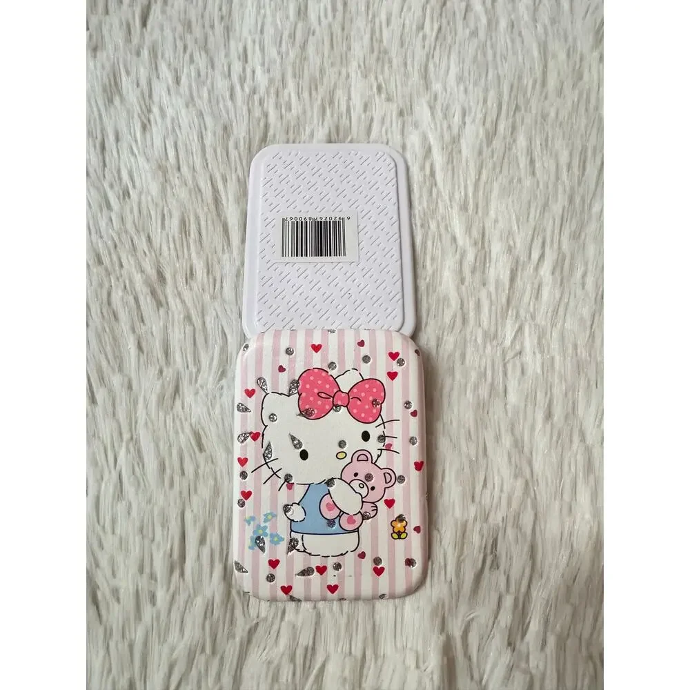 Hello Kitty pink & white striped compact mirror holding a teddy bear sparkly